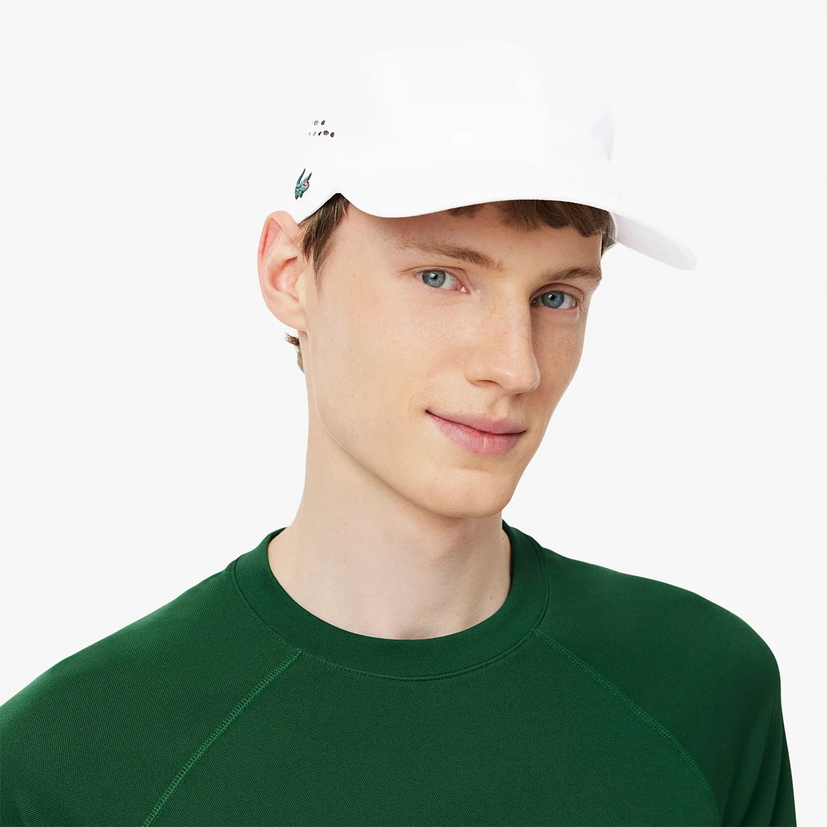 Cap Lacoste On Court