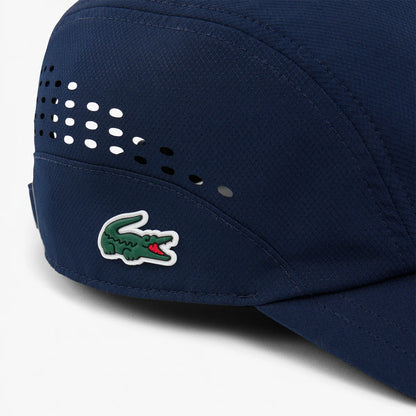 Cap Lacoste On Court